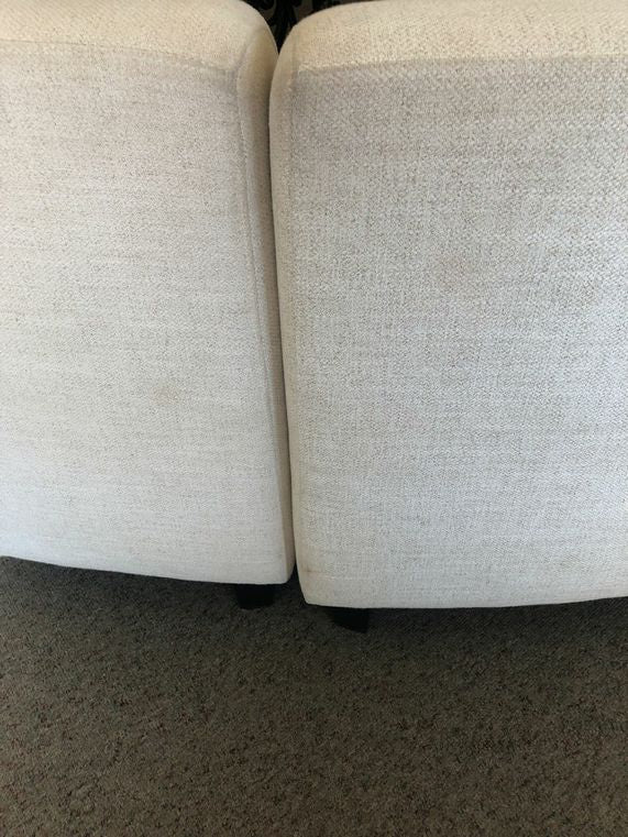 2 Piece White sectional w/4 white and 2 blue pillows