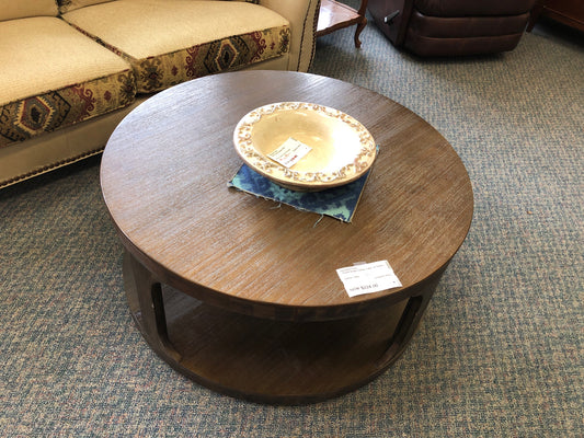 Round Brown Coffee Table on Rollers