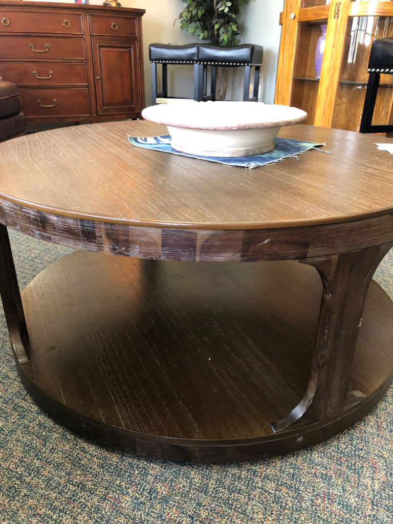 Round Brown Coffee Table on Rollers